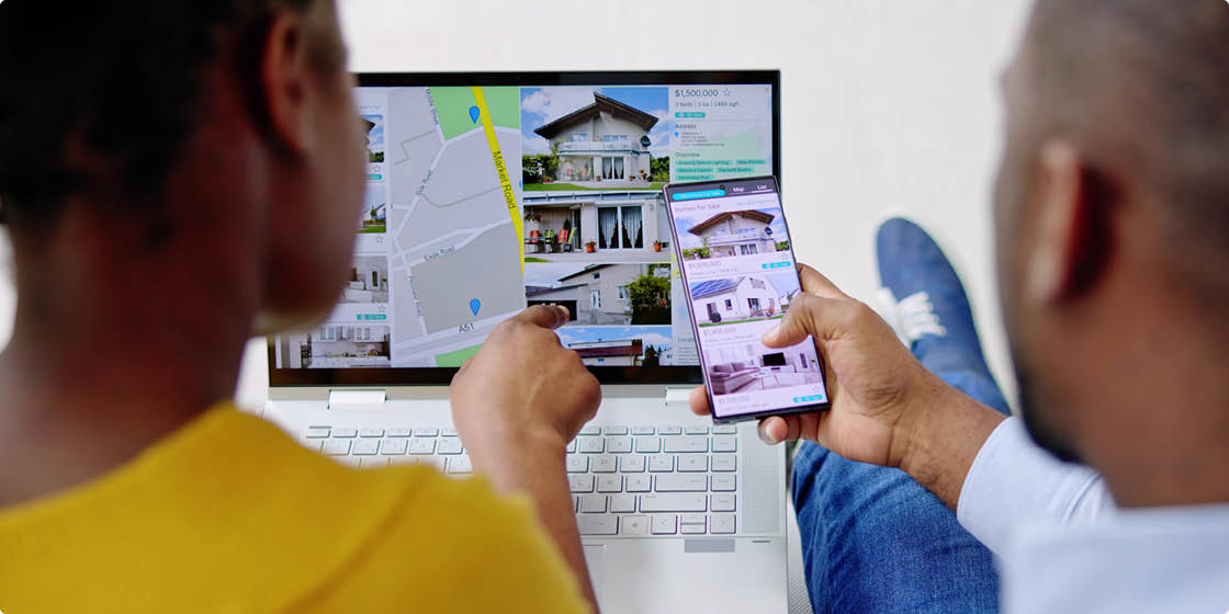 African Couple Searching Real Estate Apartment Property On Phone