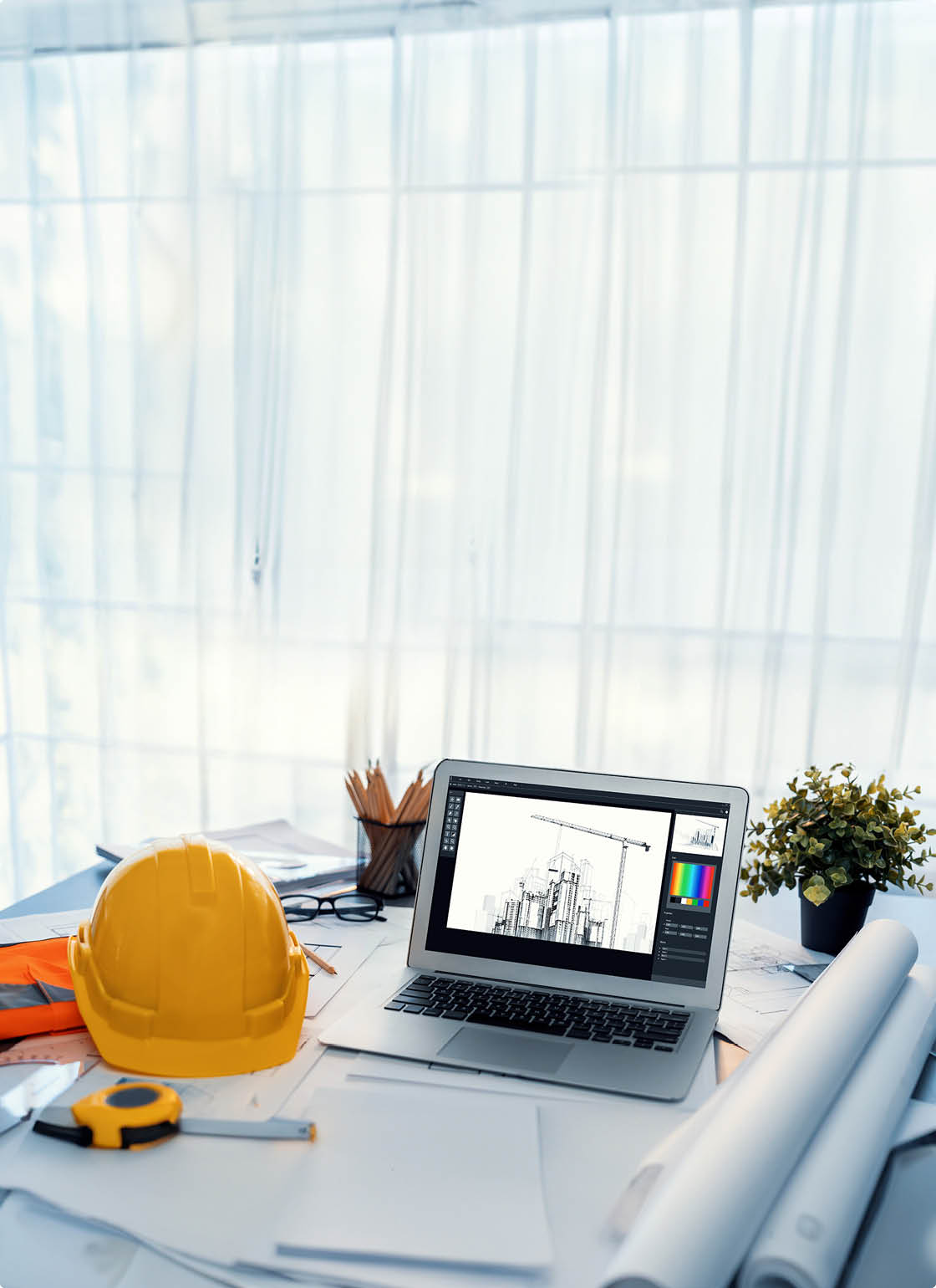 Digital blueprint by architecture design software on laptop screen with documents and blueprint layout on office table seamless integration of technology and traditional drafting method. Insight